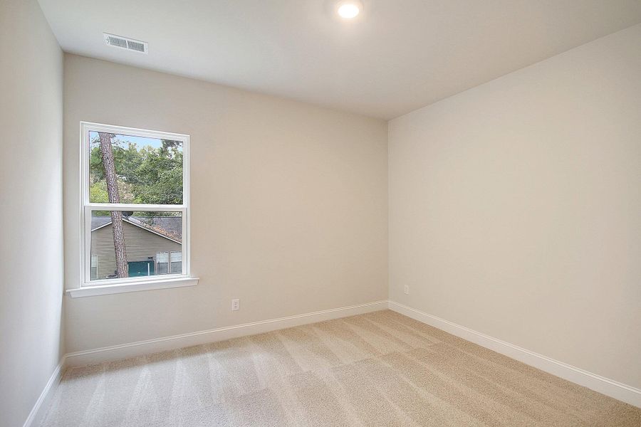 Spacious, unfurnished interior of a new home in Founder's Park, Lincolnville (Image 33).