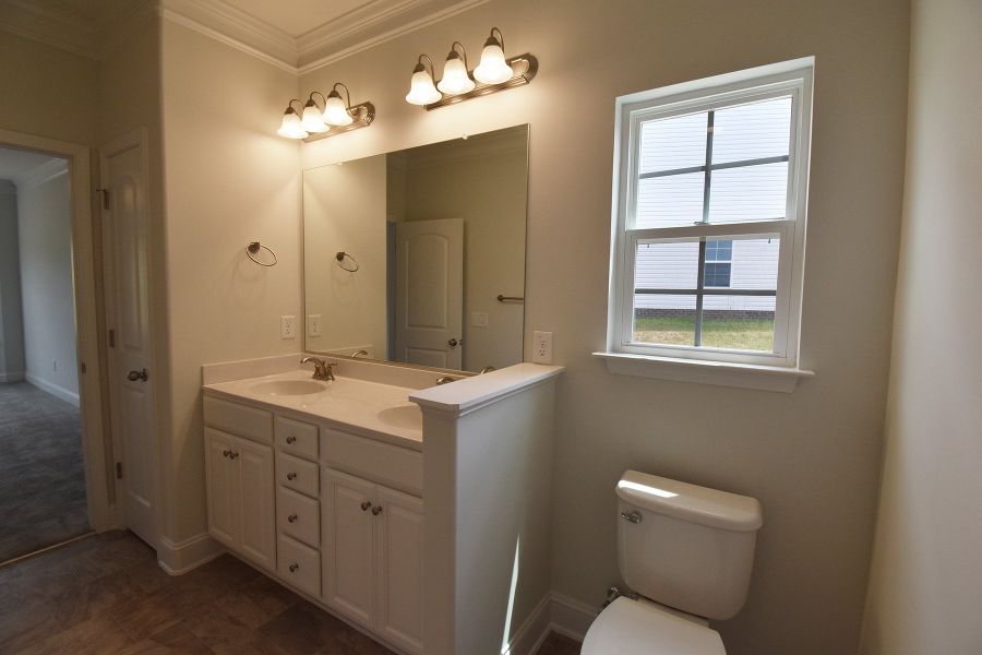 Representative furnished interior of a home built from the Ellerbe by Keystone Homes NC in Sullivans Reserve, Walkertown (Image 12).