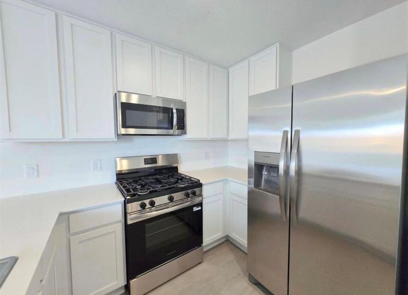 Furnished interior view inside a new home in The Grand Prairie: Cottage Collection, Hockley (Image 8).
