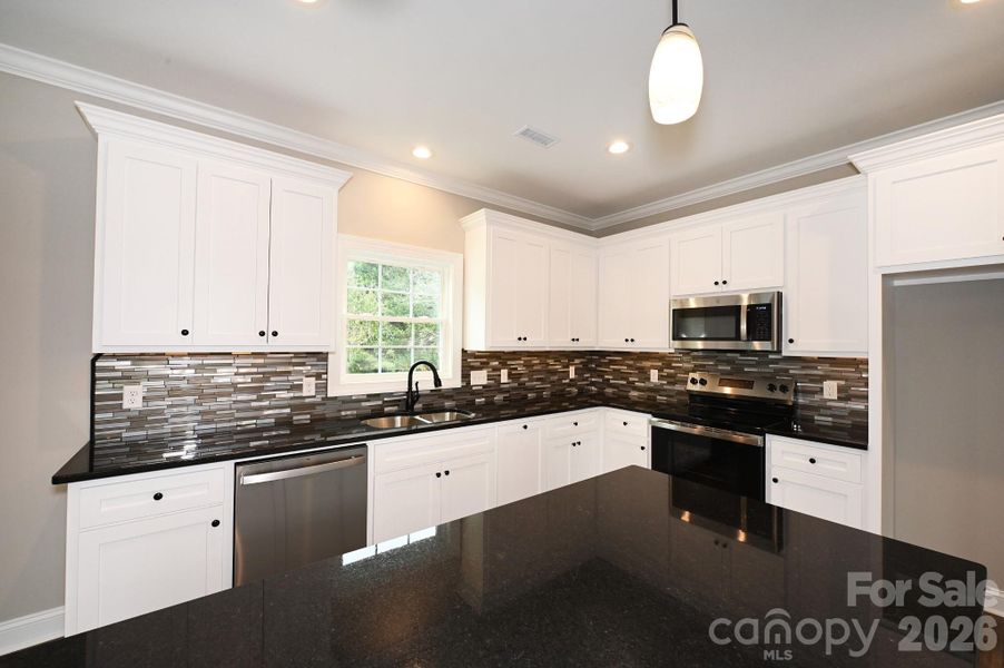 Furnished interior view inside a new home in , Hickory (Image 15).