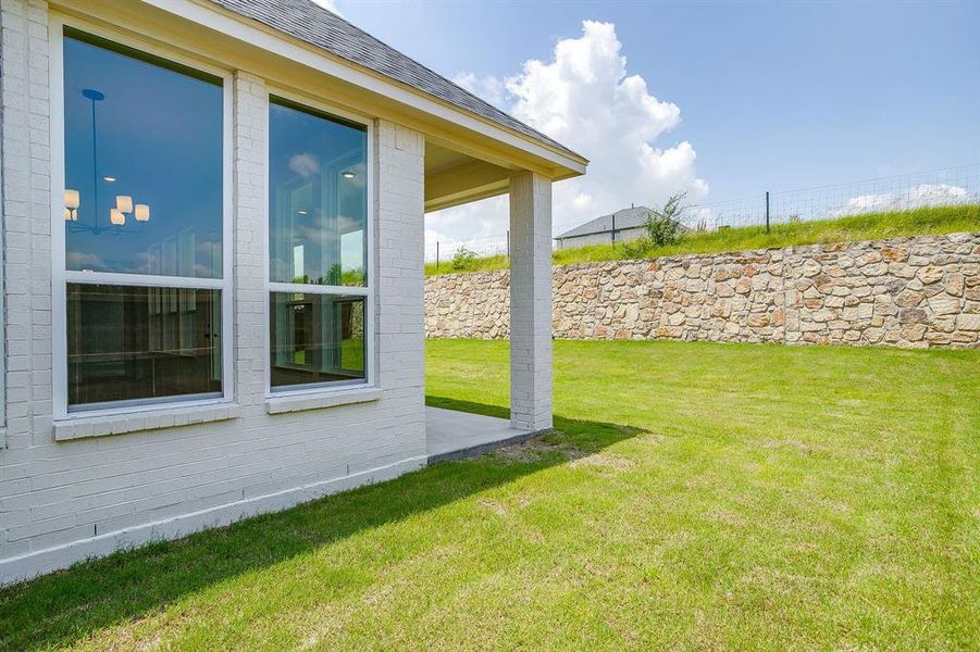 Exterior details and patio area of a home in Whitestone Crest, Benbrook (Image 4).