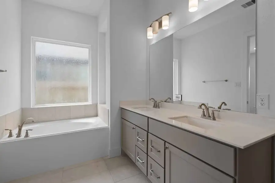Furnished interior view inside a new home in Wood Leaf Reserve, Tomball (Image 4).