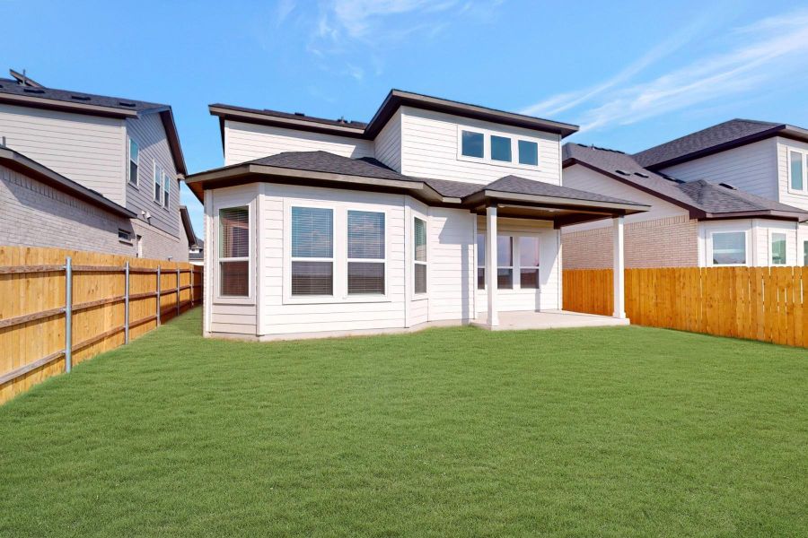 Exterior details and patio area of a home in Estancia West, Manchaca (Image 3). Exterior details and patio area of a home in Estancia West, Manchaca (Image 3).