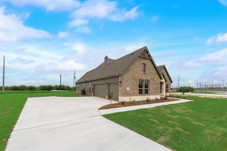 Front exterior of a new home in Parker Heights, Valley View, TX, highlighting curb appeal (Image 1).