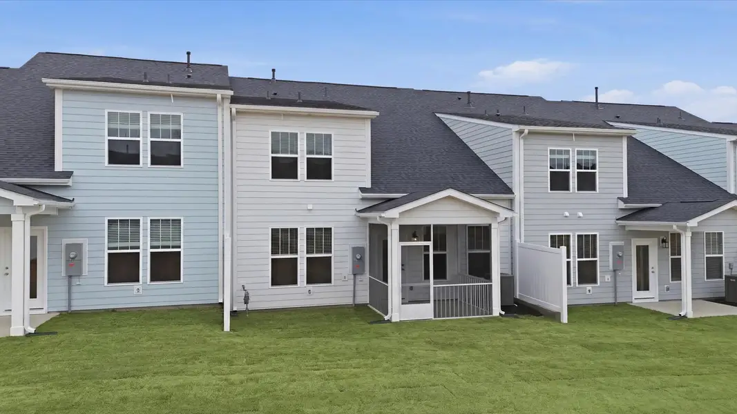 Exterior details and patio area of a home in Village at Midway, Anderson (Image 4).