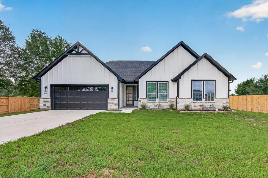 Front exterior of a new home in , Prairie View, TX, highlighting curb appeal (Image 1). Front exterior of a new home in , Prairie View, TX, highlighting curb appeal (Image 1).
