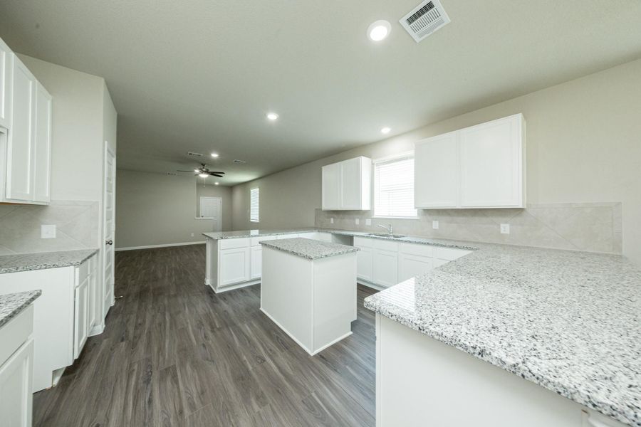 Furnished interior view inside a new home in Ridgeland Hills, Willis (Image 5).