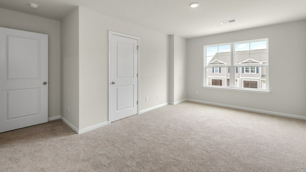 Representative unfurnished interior of a home built from the PEARSON TOWNHOME by D.R. Horton in Grayson Park Townhomes, Leland (Image 20).