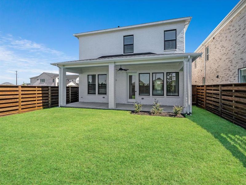 Exterior details and patio area of a home in Royal Court, Frisco (Image 3).