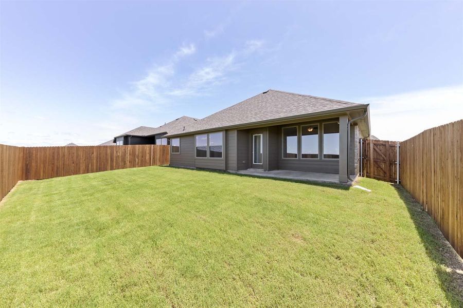 Exterior details and patio area of a home in Heartland, Heartland (Image 3).