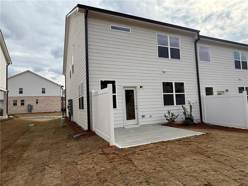 Exterior details and patio area of a home in The Towns at Auburn Station West, Auburn (Image 3).