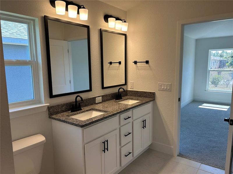 Furnished interior view inside a new home in Watercress Cove, North Port (Image 4).