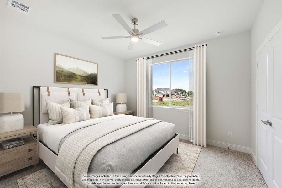 Bedroom with upholstered bed, ceiling fan, carpet flooring, and large window with white curtains Bedroom with upholstered bed, ceiling fan, carpet flooring, and large window with white curtains