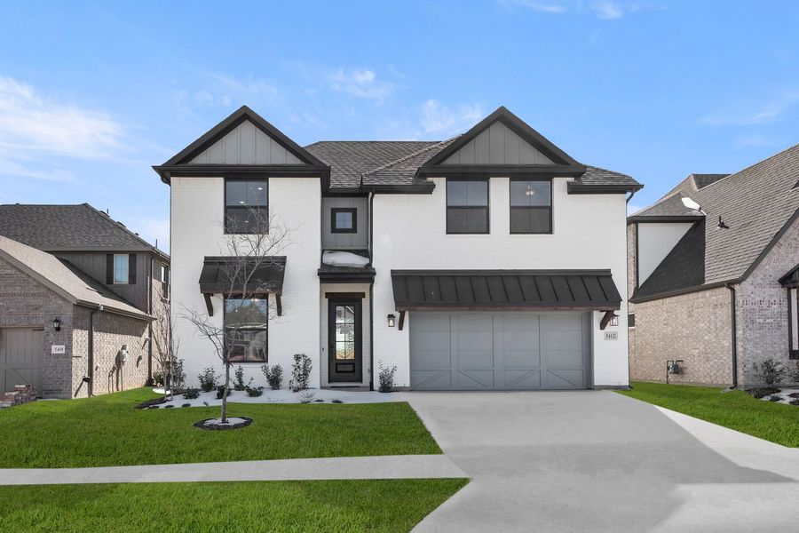 Front exterior of a new home in Lily Creek at Sutton Fields, Aubrey, TX, highlighting curb appeal (Image 1). Front exterior of a new home in Lily Creek at Sutton Fields, Aubrey, TX, highlighting curb appeal (Image 1).