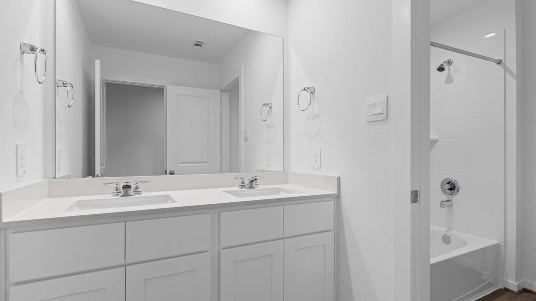 Representative furnished interior of a home built from the GARLAND by D.R. Horton in Grand Cay Harbour, Texas City (Image 17). Representative furnished interior of a home built from the GARLAND by D.R. Horton in Grand Cay Harbour, Texas City (Image 17).