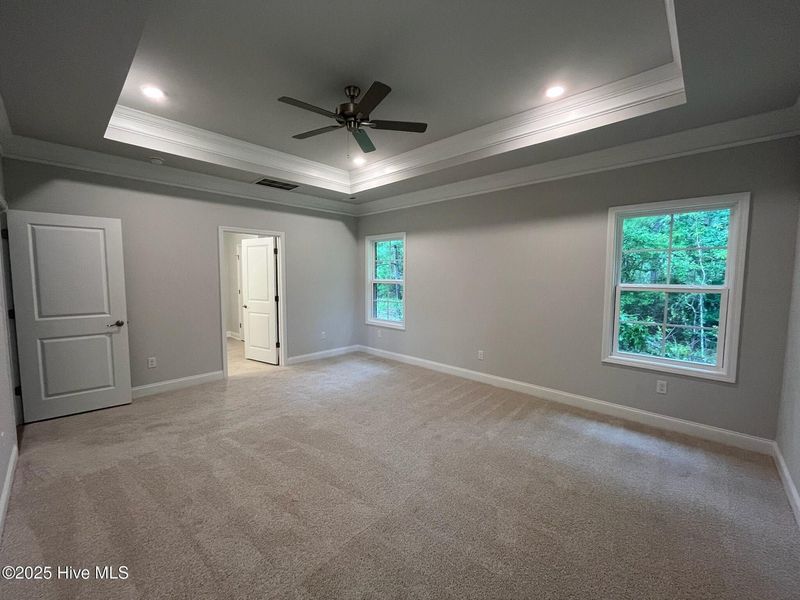 Spacious, unfurnished interior of a new home in Palmetto Creek, Bolivia (Image 14).