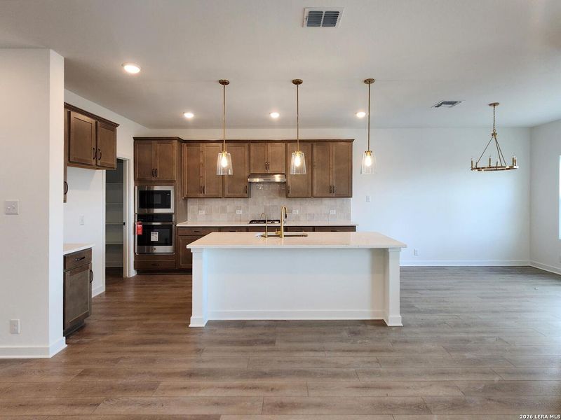 Furnished interior view inside a new home in Nopal Valley, San Antonio (Image 6).