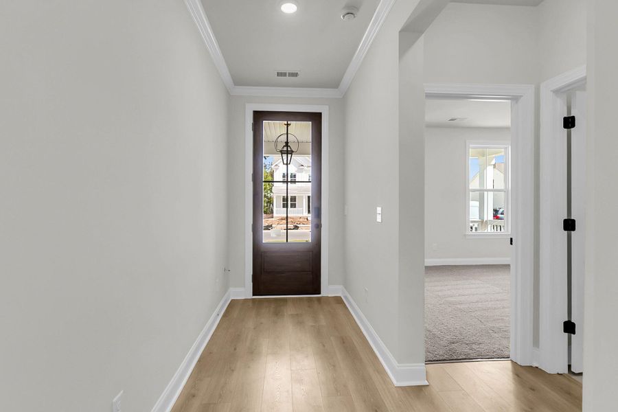 Spacious, unfurnished interior of a new home in Tidewater at Lakes of Cane Bay, Summerville (Image 37).