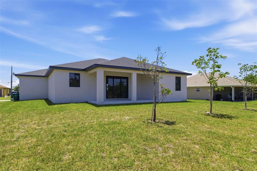 Exterior details and patio area of a home in , Port Charlotte (Image 3).