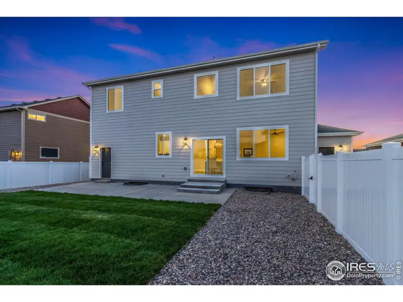 Front exterior of a new home in , Wellington, CO, highlighting curb appeal (Image 20).