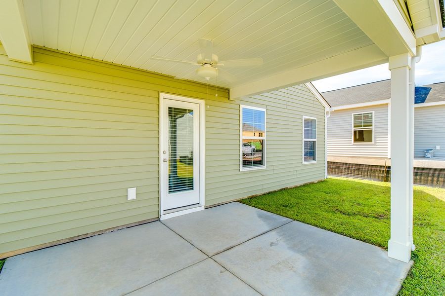 Front exterior of a new home in Winston Point, Gilbert, SC, highlighting curb appeal (Image 18). Front exterior of a new home in Winston Point, Gilbert, SC, highlighting curb appeal (Image 18).