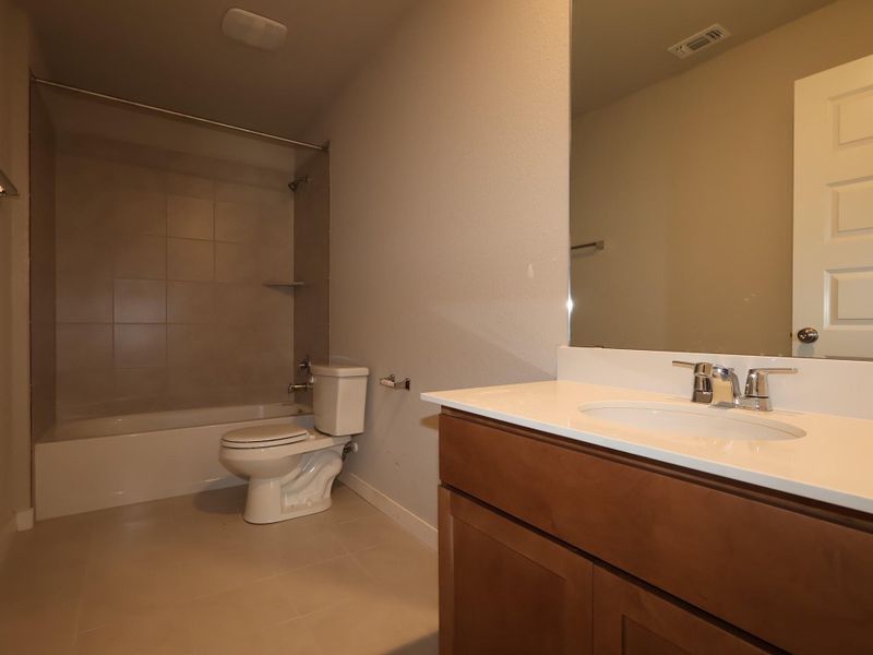 Furnished interior view inside a new home in Willow Springs, Buda (Image 8).