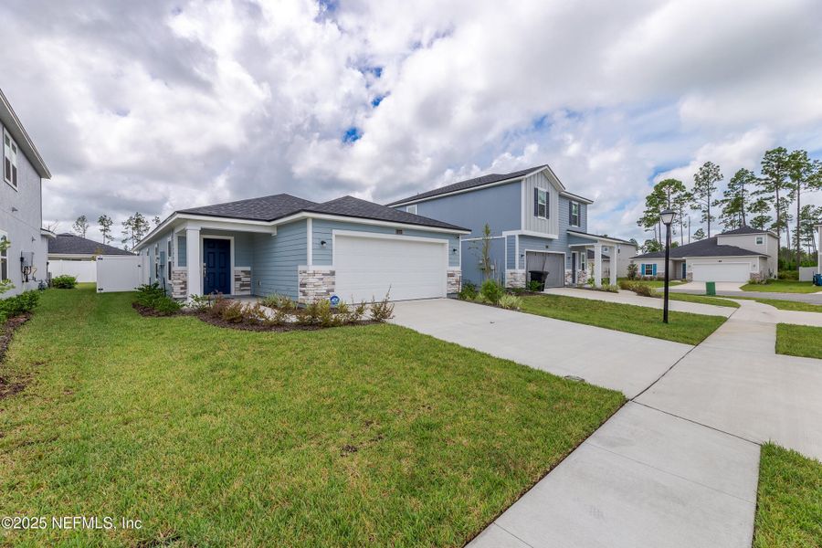 Front exterior of a new home in , St. Augustine, FL, highlighting curb appeal (Image 20). Front exterior of a new home in , St. Augustine, FL, highlighting curb appeal (Image 20).