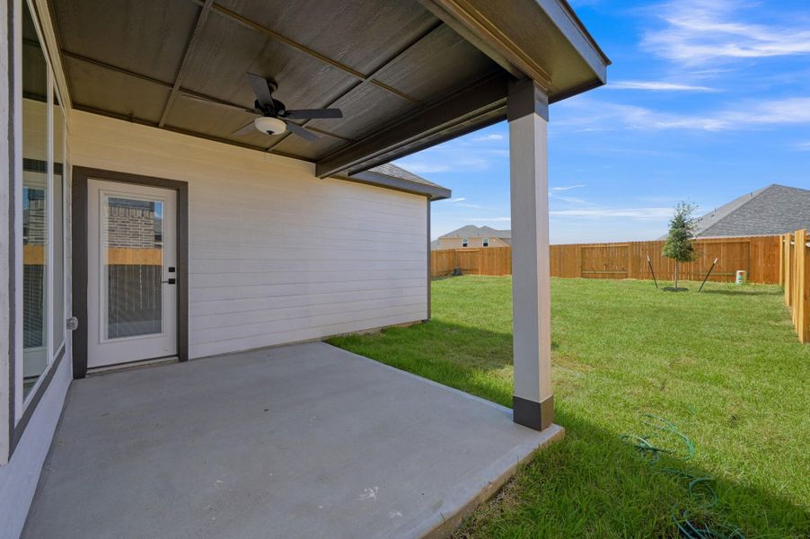 Exterior details and patio area of a home in Magnolia Woods, Magnolia (Image 4).