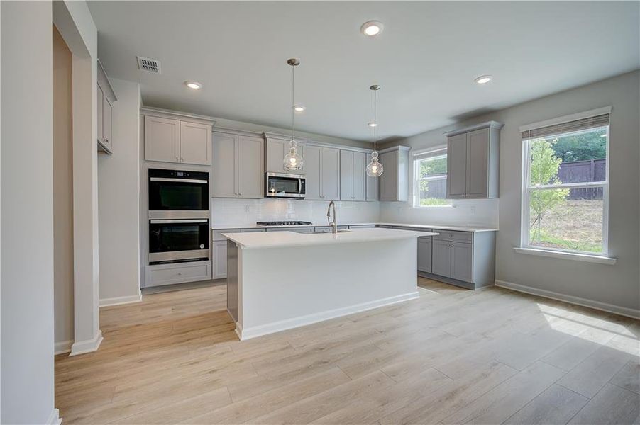 Furnished interior view inside a new home in Abbotts Crossing, Conyers (Image 5). Furnished interior view inside a new home in Abbotts Crossing, Conyers (Image 5).