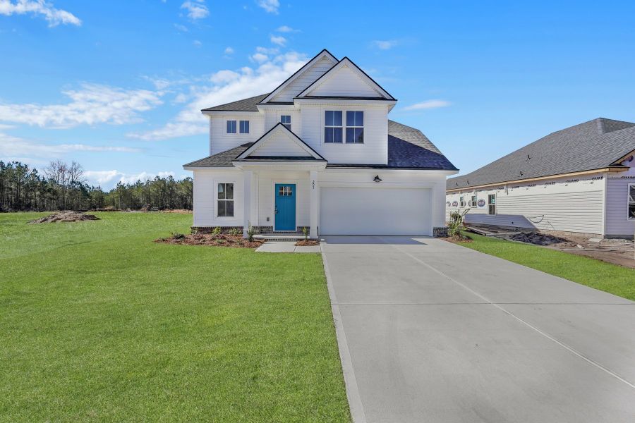 Representative exterior photo of a completed home built from the Sherwood by Ernest Homes in Wexford, Richmond Hill, GA (Image 30).