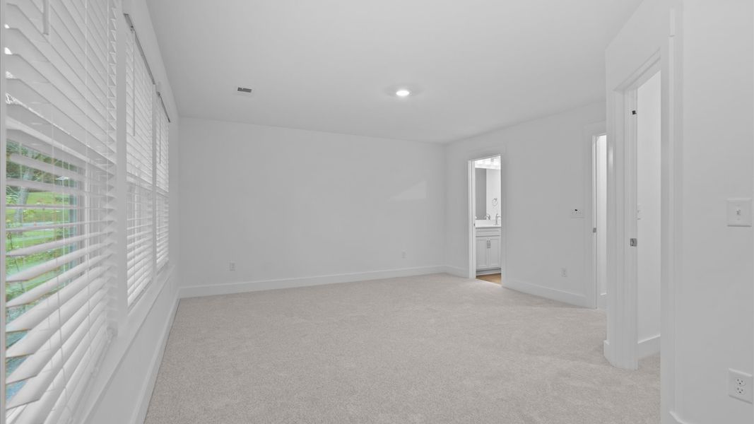 Spacious and serene primary suite with thoughtful design in a desirable DRB Homes community Spacious and serene primary suite with thoughtful design in a desirable DRB Homes community