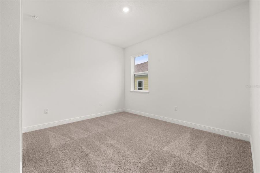 Spacious, unfurnished interior of a new home in Green Key Village, Lady Lake (Image 22).