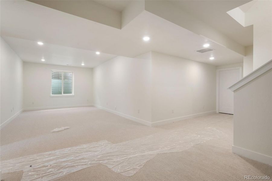 Spacious, unfurnished interior of a new home in Festival at RainDance, Windsor (Image 10).