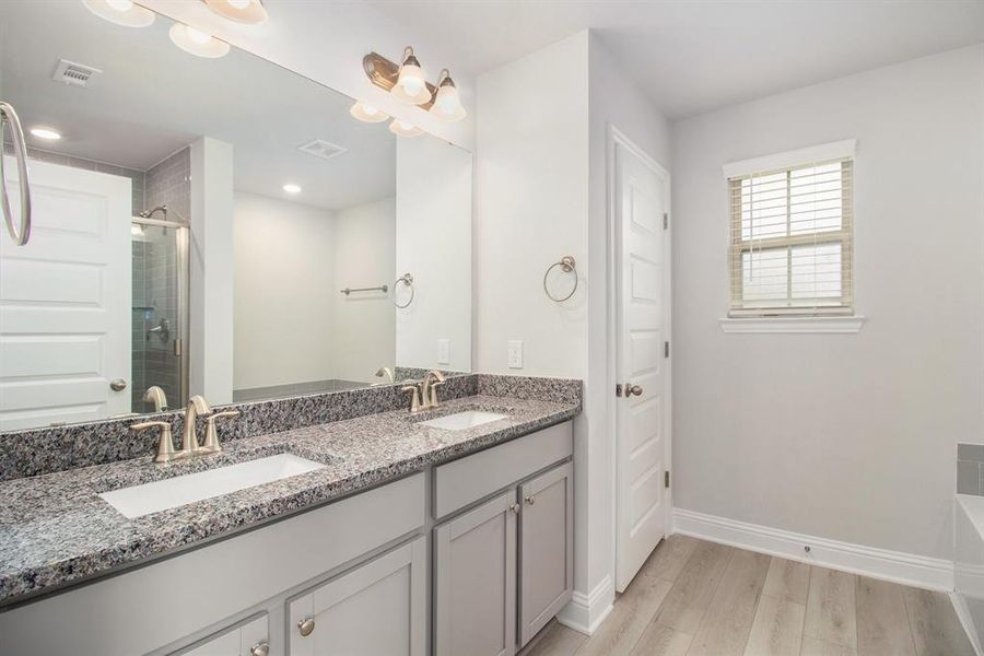 Primary Bathroom with Double Vanity Sinks