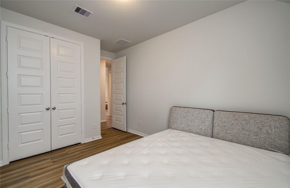 Furnished interior view inside a new home in Sunterra, Katy (Image 22).