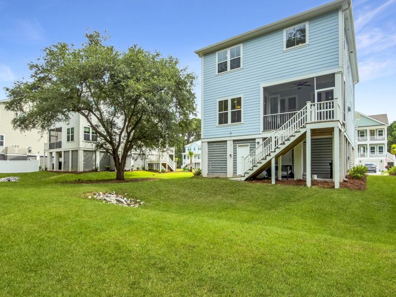 Exterior details and patio area of a home in Overlook at Copahee Sound, Awendaw (Image 30).