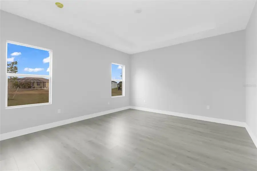 Spacious, unfurnished interior of a new home in , Port Charlotte (Image 16).