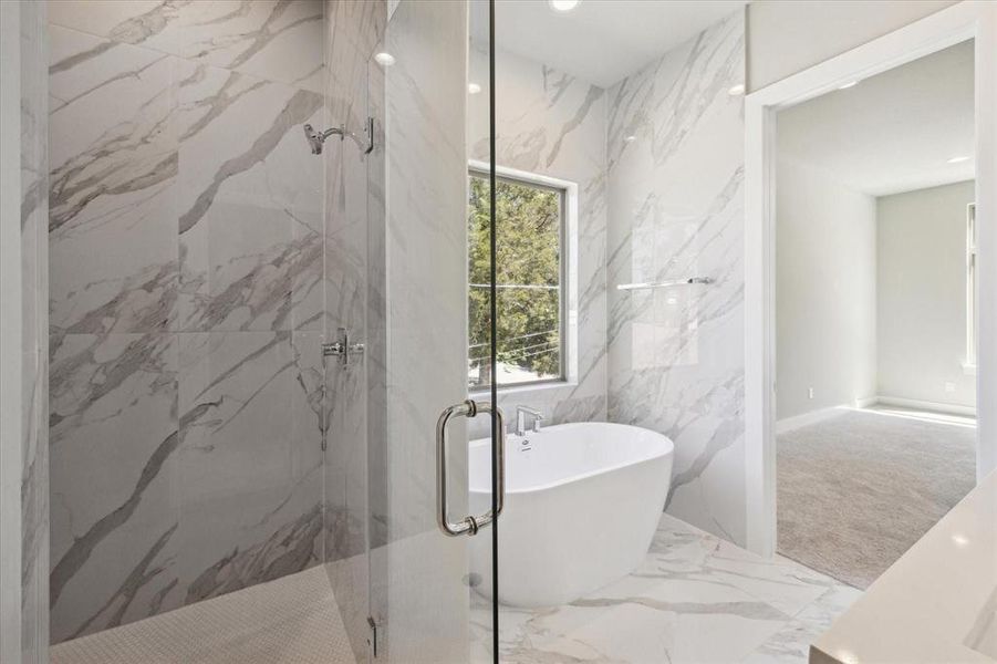 Primary bath with shower and soaking tub