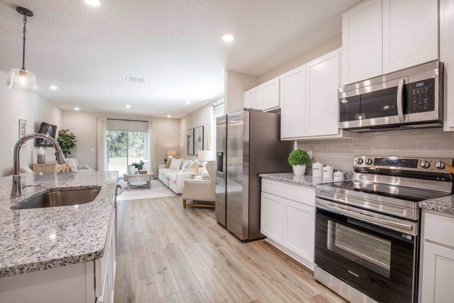 Representative furnished interior of a home built from the Maple by Maronda Homes in Malabar Springs, Palm Bay (Image 39).