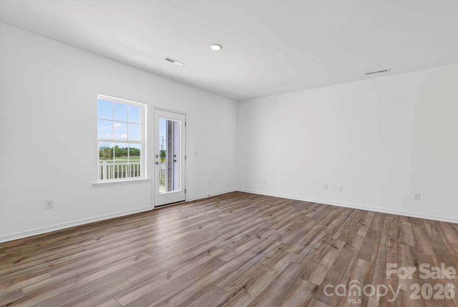 Family room leads to the covered balcony
