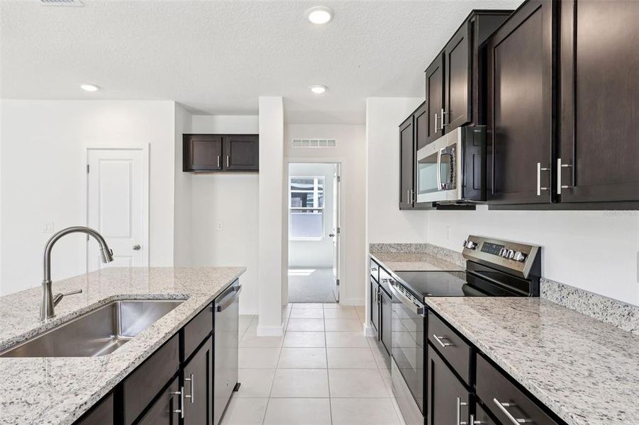 Furnished interior view inside a new home in Hamilton Bluff, Haines City (Image 7).