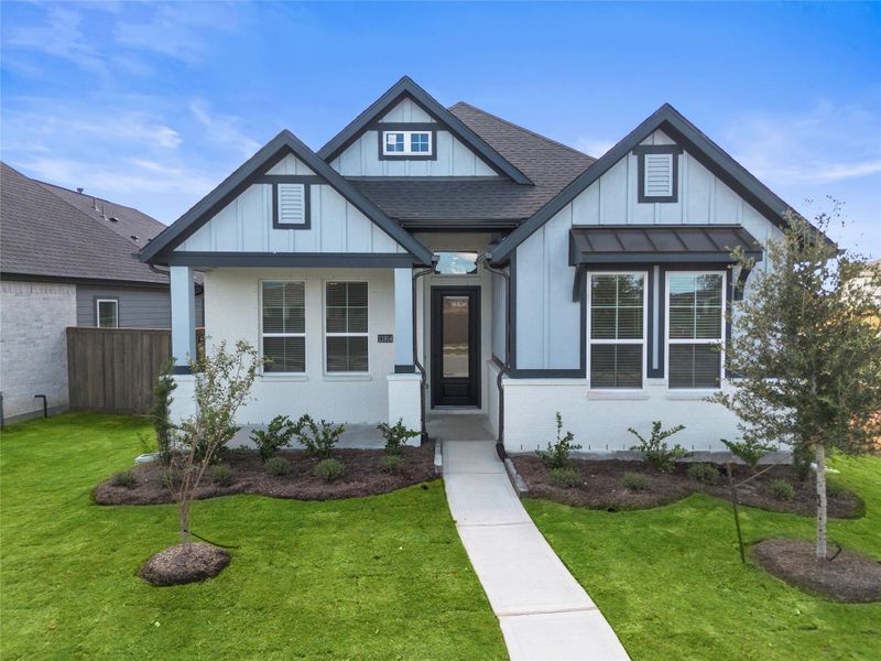 Front exterior of a new home in Riceland, Mont Belvieu, TX, highlighting curb appeal (Image 20).