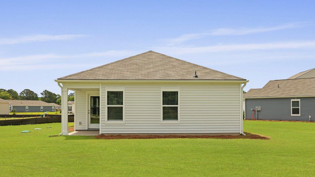 Exterior details and patio area of a home in Evergreen, Holly Hill (Image 3).