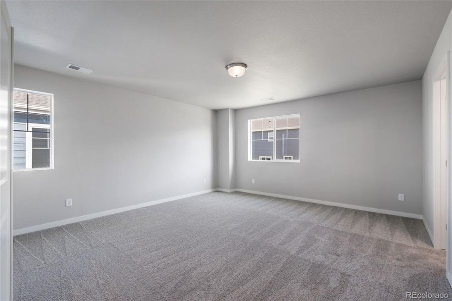 Spacious, unfurnished interior of a new home in Sky Ranch – Uptown Collection, Watkins (Image 15).