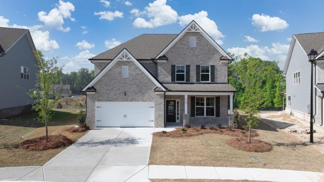 Front exterior of a new home in Butner Estates, South Fulton, GA, highlighting curb appeal (Image 1). Front exterior of a new home in Butner Estates, South Fulton, GA, highlighting curb appeal (Image 1).