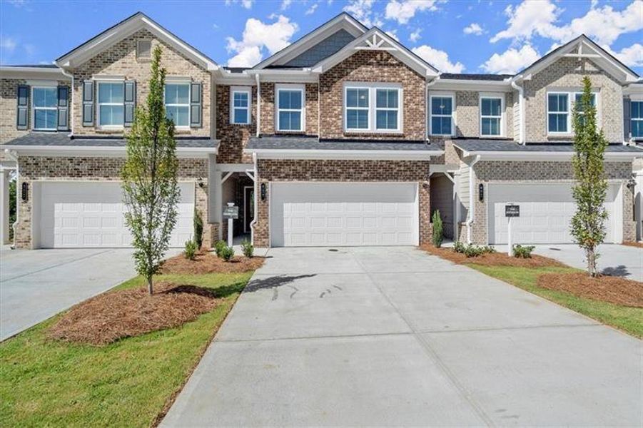 Front exterior of a new home in , Dacula, GA, highlighting curb appeal (Image 29).