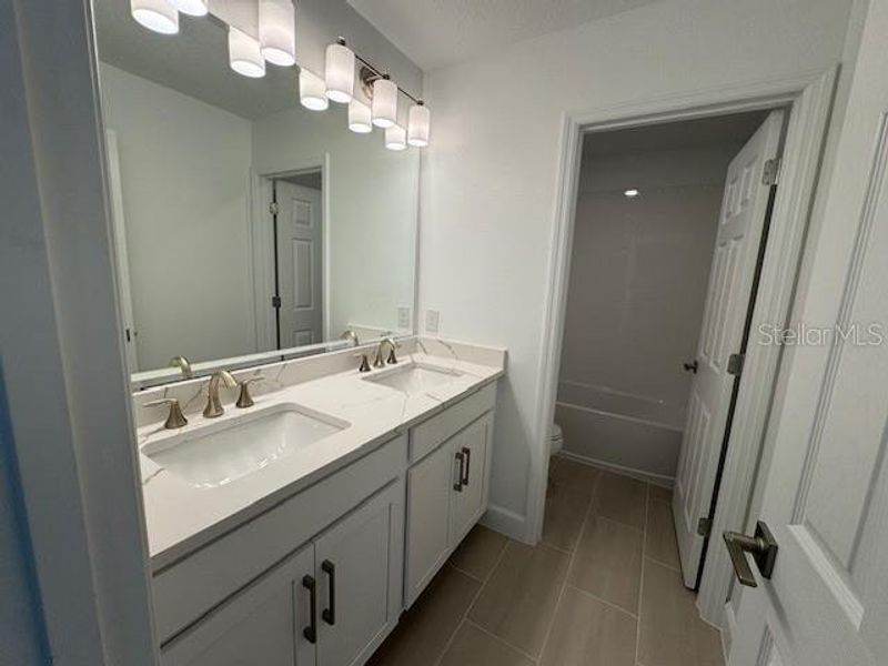 Furnished interior view inside a new home in Harrell Oaks, Orlando (Image 3).