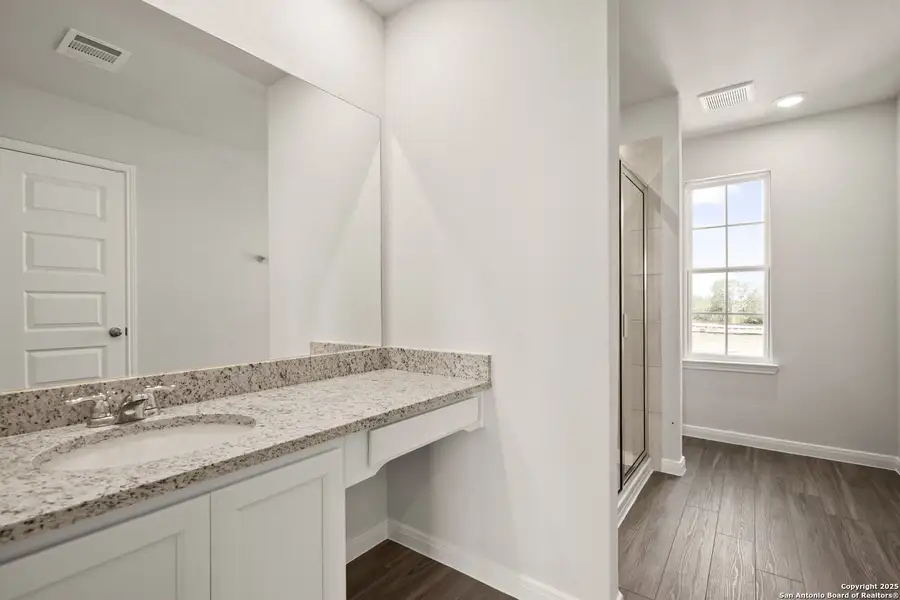 Furnished interior view inside a new home in Abbott Place, St. Hedwig (Image 9).