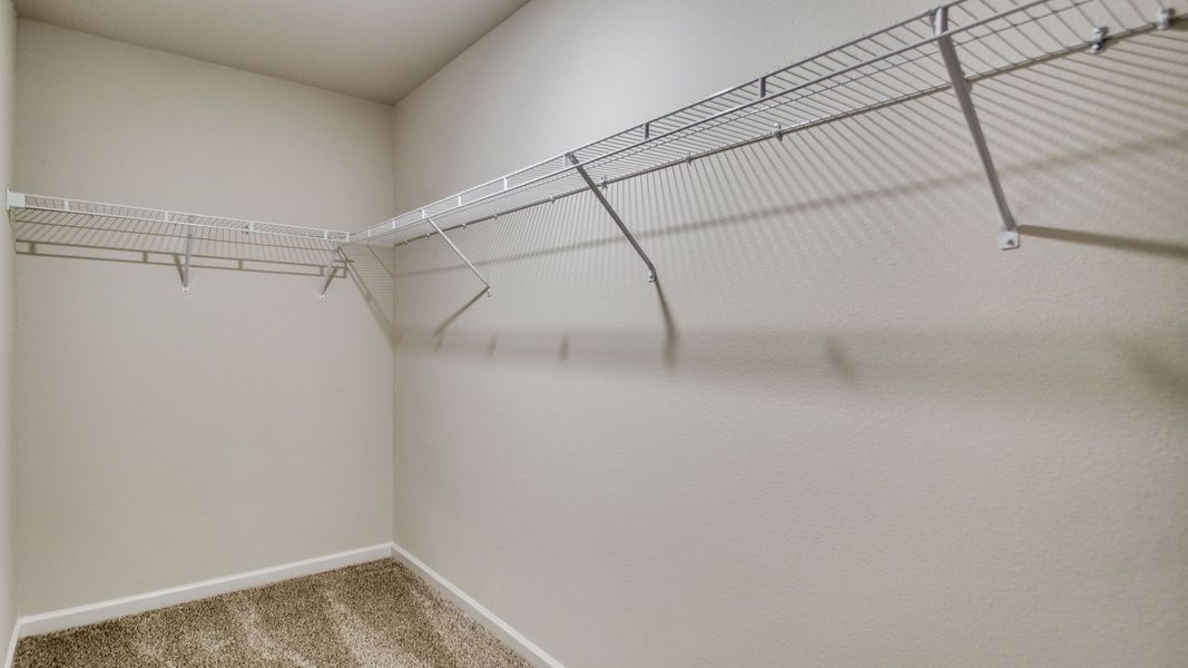 Spacious, unfurnished interior of a new home in The Enclave at Bar W Ranch, Baker (Image 24).