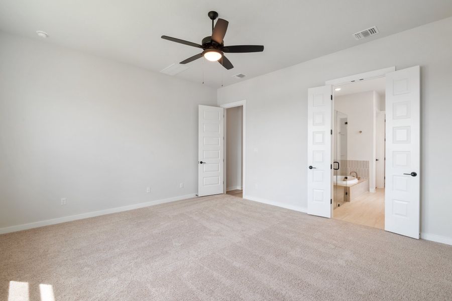 Spacious, unfurnished interior of a new home in Lariat, Liberty Hill (Image 42).